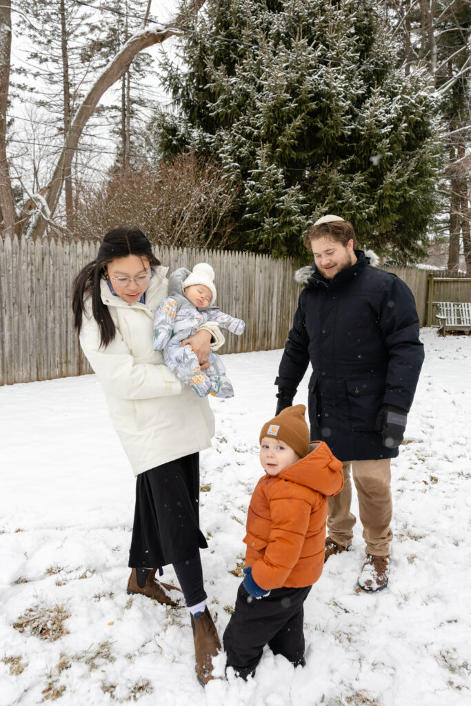 Family outside in the snow